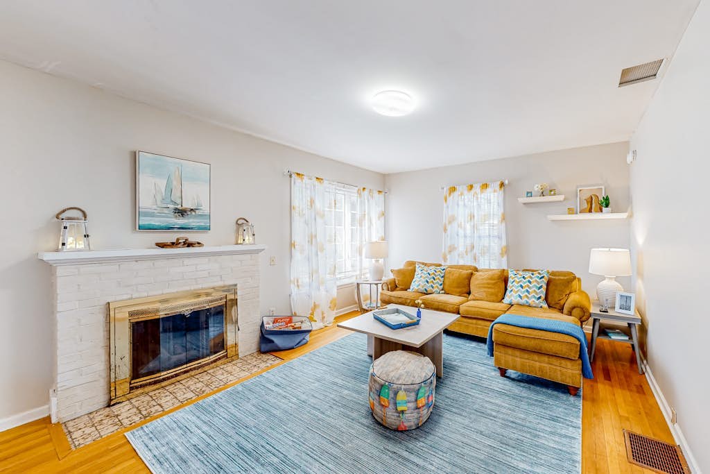 Warm & inviting retreat with a full kitchen, gas fireplace, & furnished patio