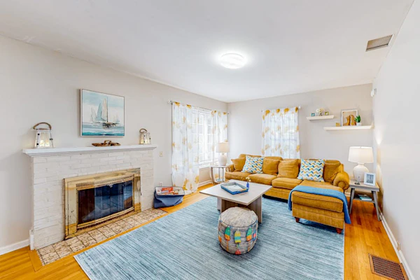 Warm & inviting retreat with a full kitchen, gas fireplace, & furnished patio