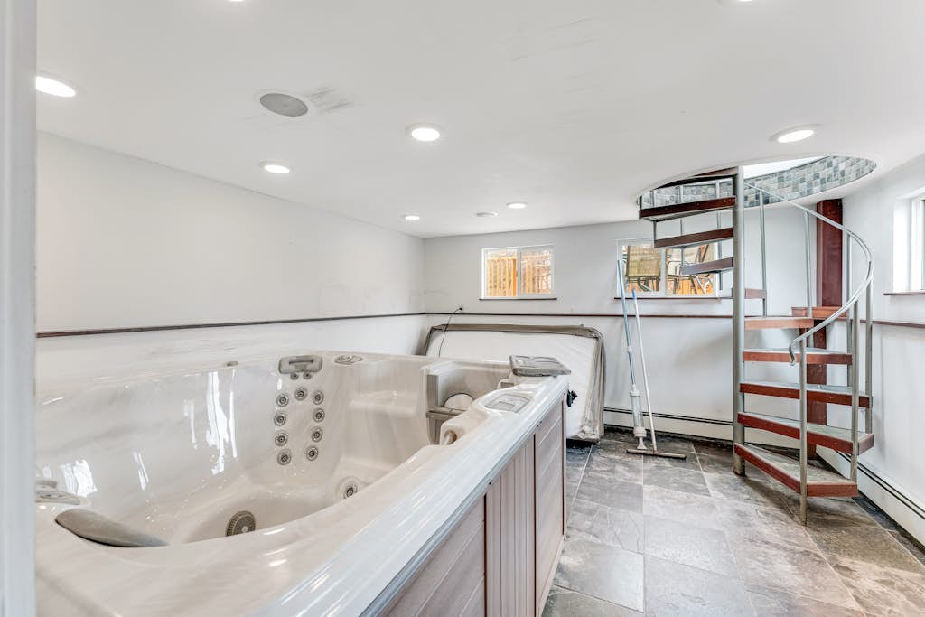 Home on Lake Champlain with pool, hot tub, in-home gym, firepit, & lovely views