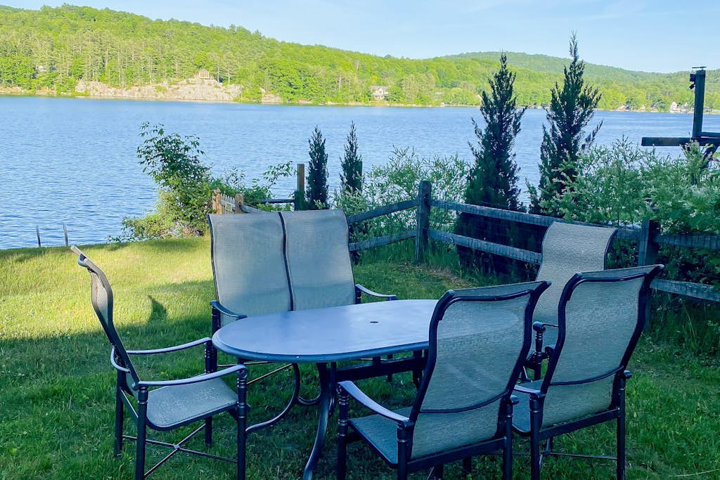 Dog-friendly lakefront oasis with scenic patio & firepit - near skiing & golf