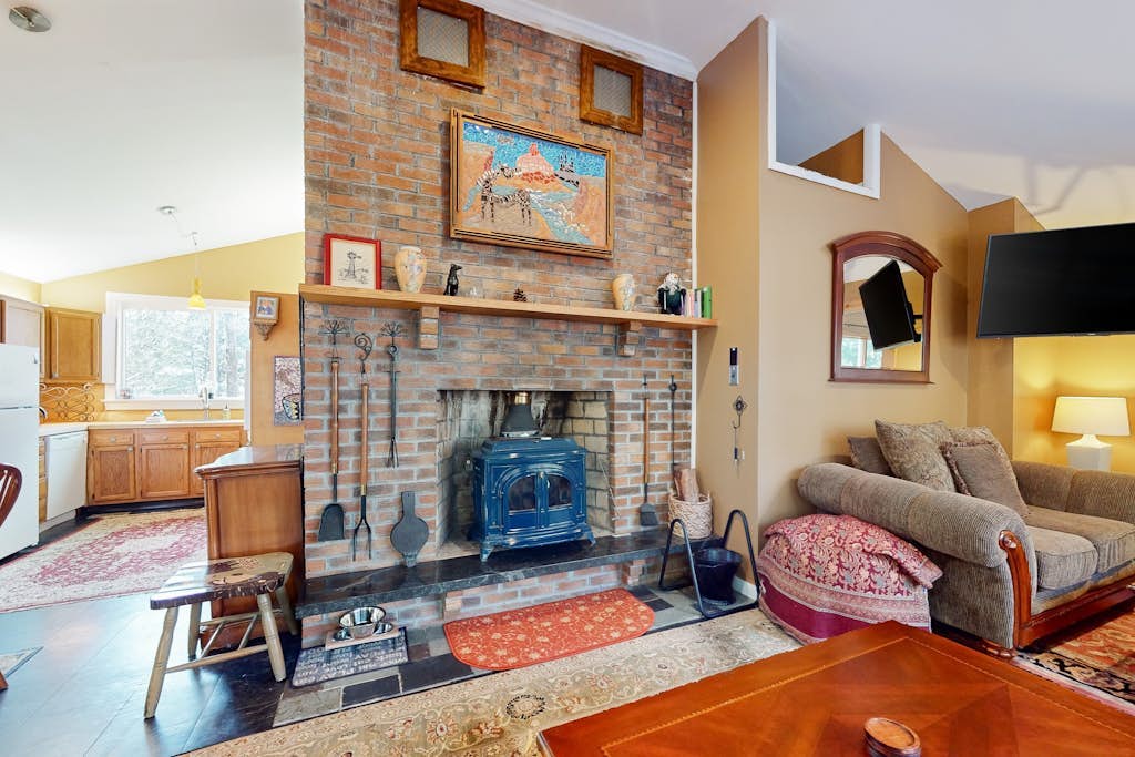 Dog-friendly forest home on 2.6 acres with hot tub, EV charger & woodstove