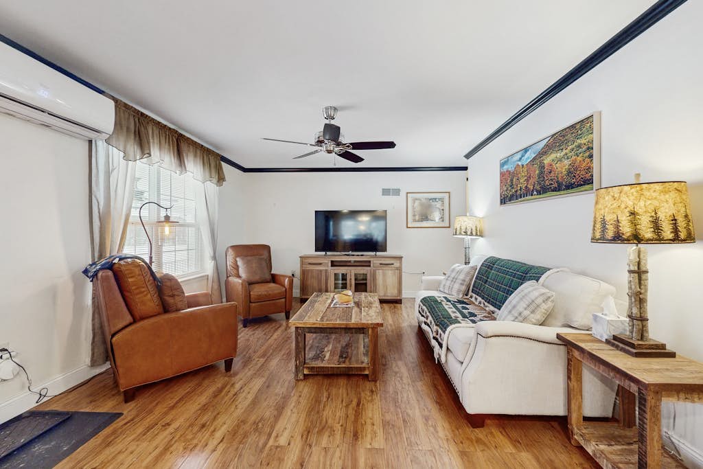 Riverfront, dog-friendly, mountain views, a/c, deck, ski nearby, gas stove, w/d