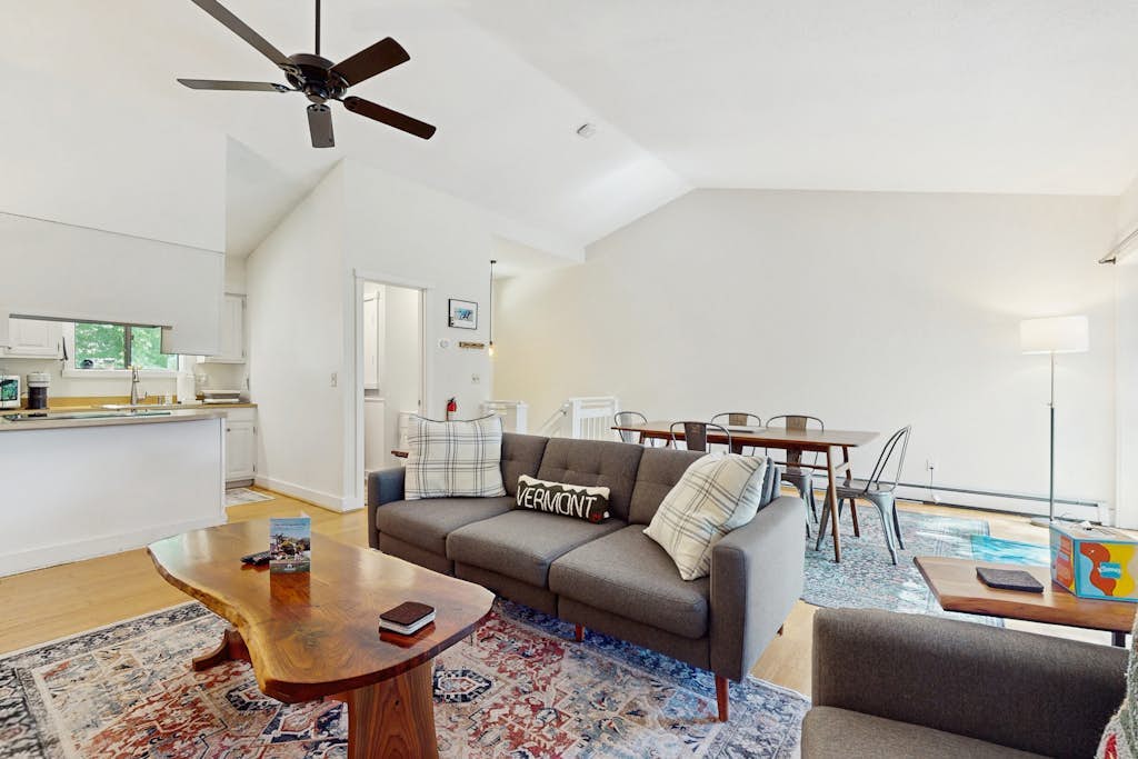 Cozy condo w/ balcony, river view, electric woodstove, w/d, wifi, kitchen, a/c