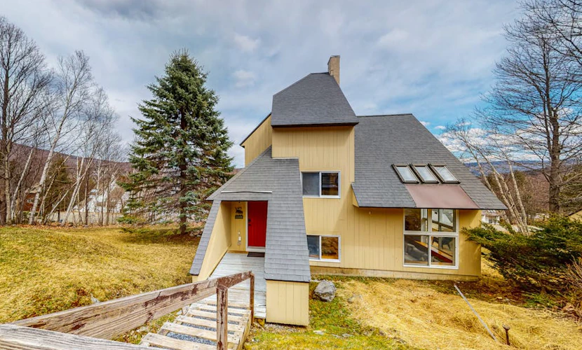 Mountain-view home with new deck, fireplace, & shared pool - walk to lifts