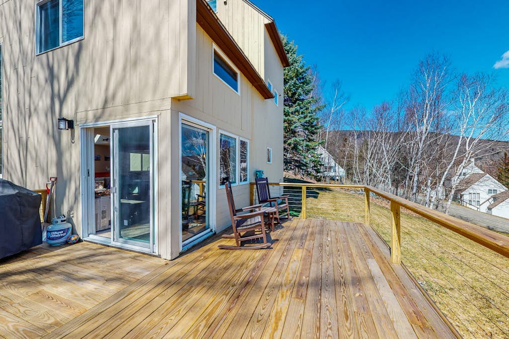 Mountain-view home with new deck, fireplace, & shared pool - walk to lifts