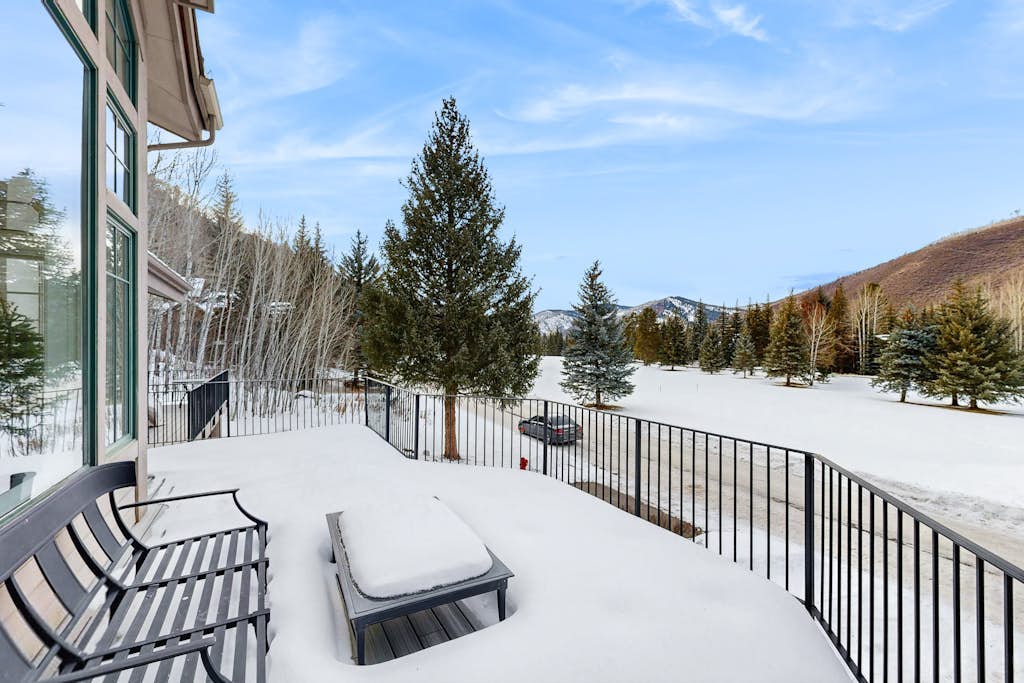 Modern Vail retreat with golf course views, bus to slopes, and has a fireplace