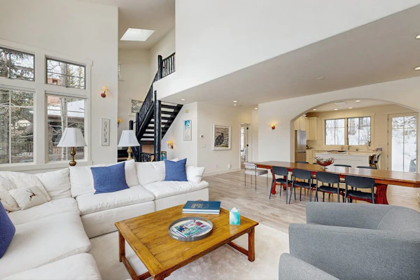 Modern Vail retreat with golf course views, bus to slopes, and has a fireplace