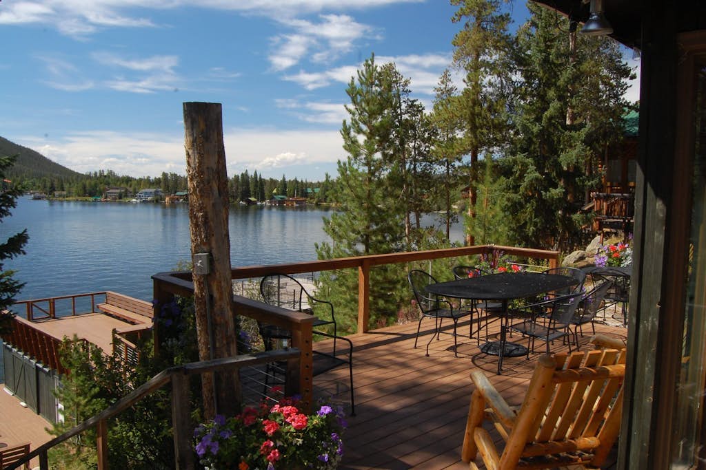 Original charmer with expansive waterfront deck, dock, fireplace - walkable area