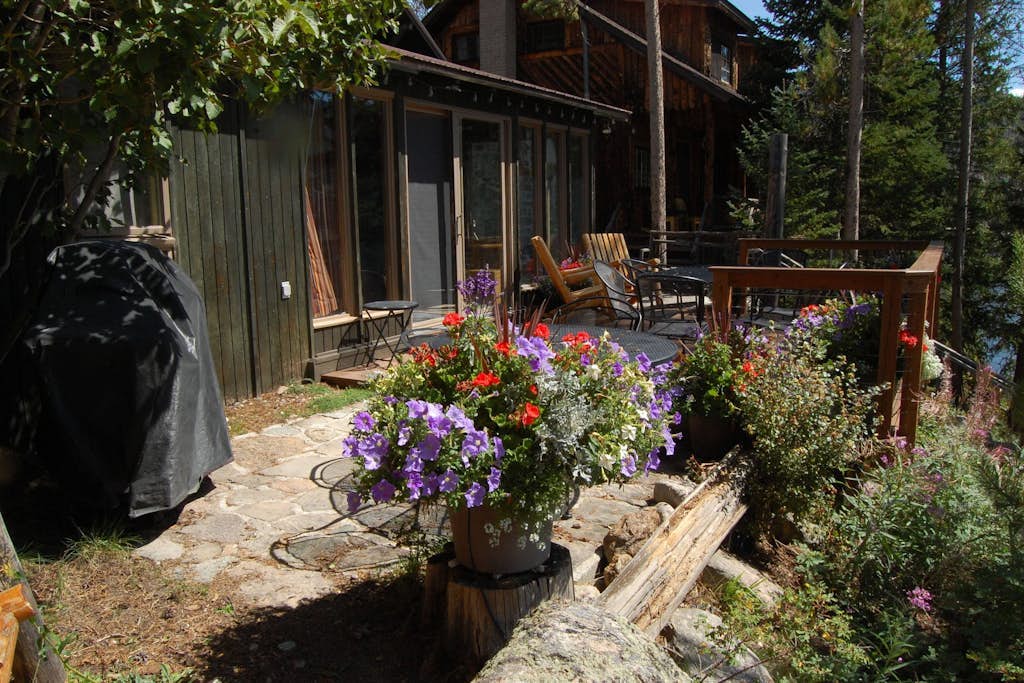 Original charmer with expansive waterfront deck, dock, fireplace - walkable area
