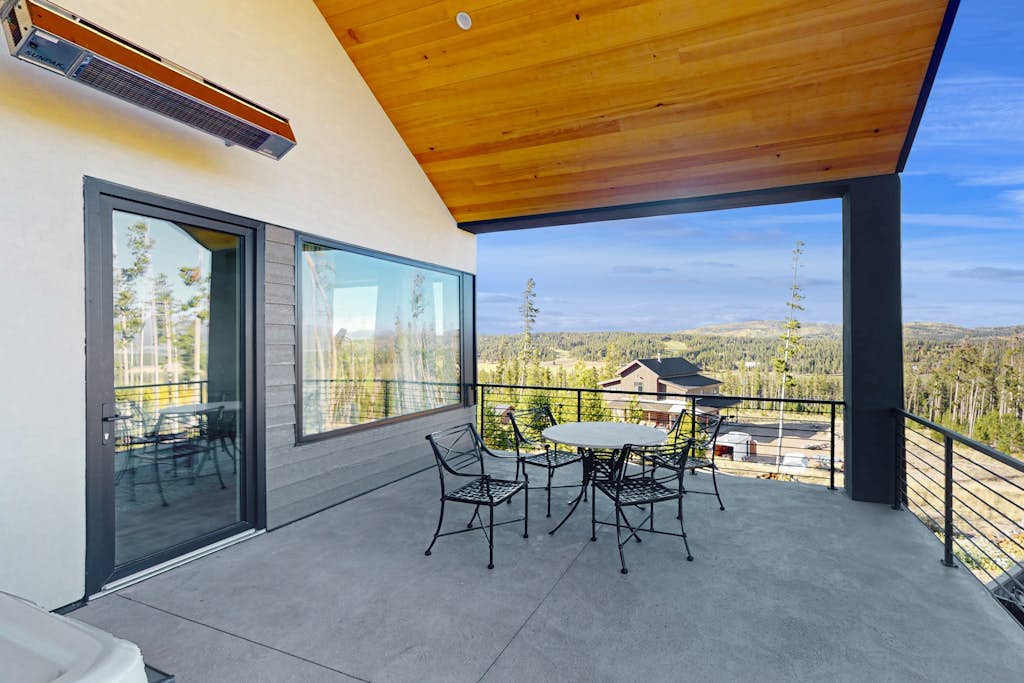 Modern home with a hot tub, game room and fabulous deck space!