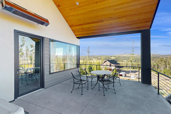 Modern home with a hot tub, game room and fabulous deck space!