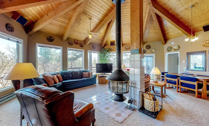 Dog-friendly home with indoor hot tub, fireplace, great views & pool access