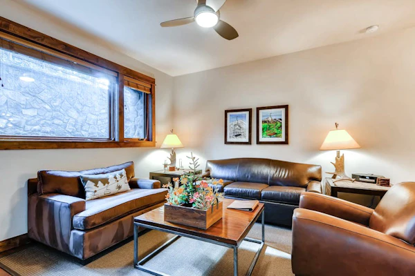 Breckenridge villa with open layout, fireplace, hot tub, & resort amenities