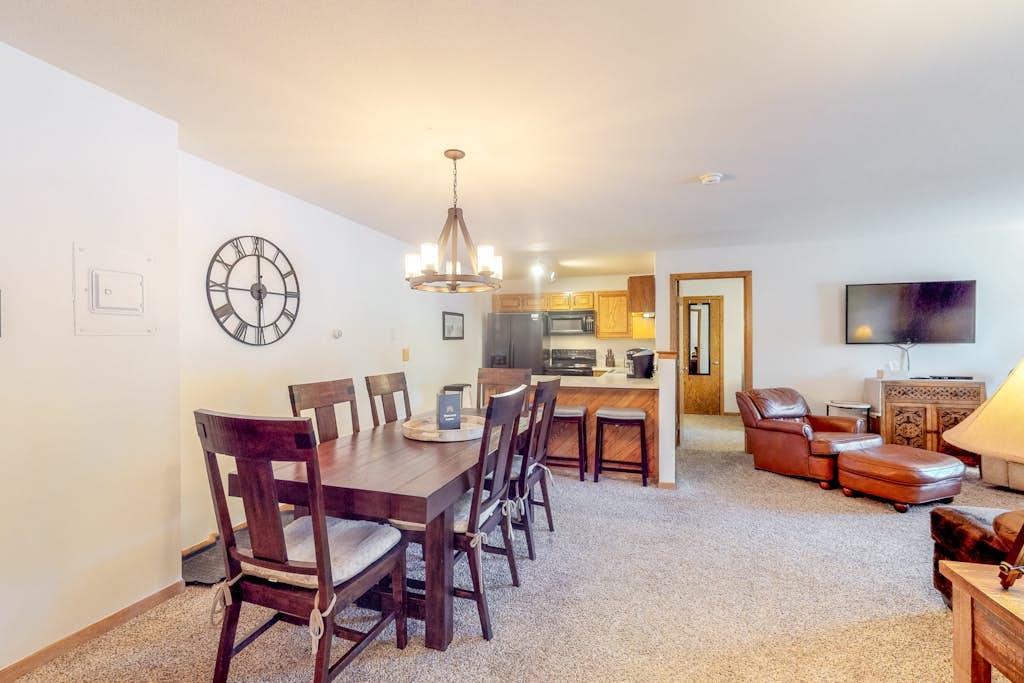 Comfortable mountain condo with wood-burning fireplace & patio, near skiing