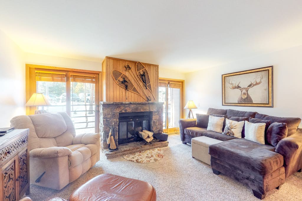 Comfortable mountain condo with wood-burning fireplace & patio, near skiing