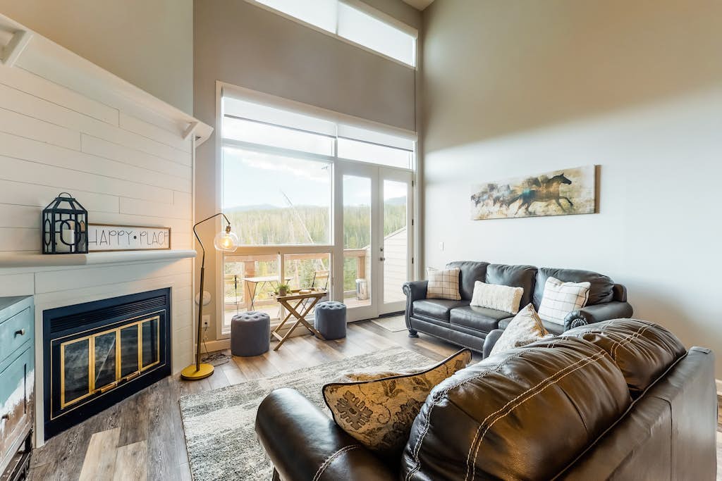 Modern condo with mountain views from balcony and gas fireplace