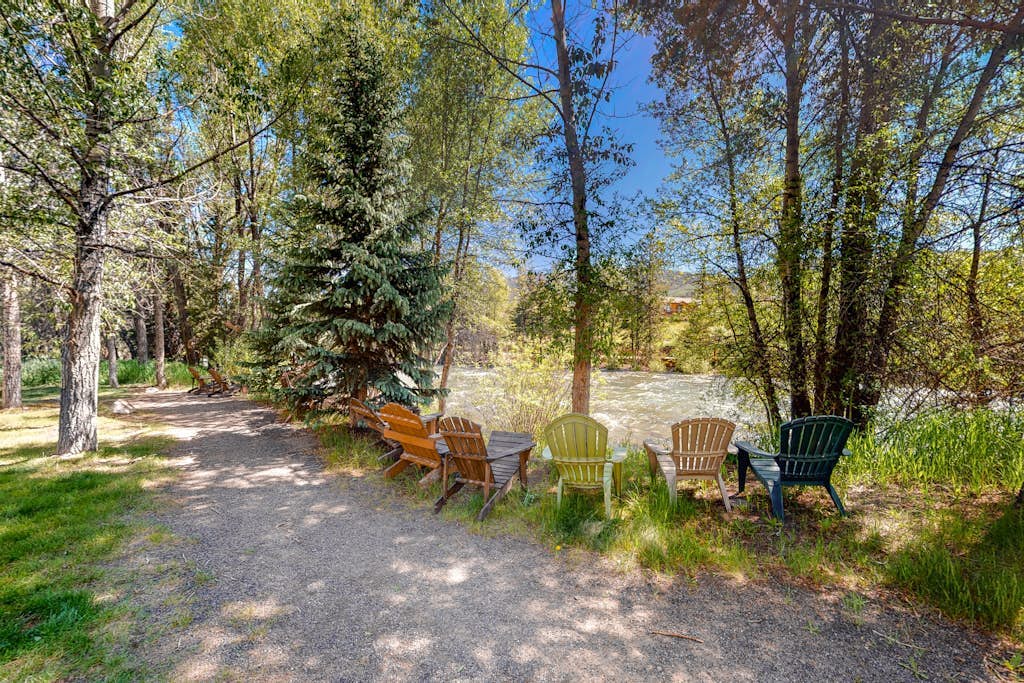 Two-story, riverfront condo with balcony & fireplace - close to everything