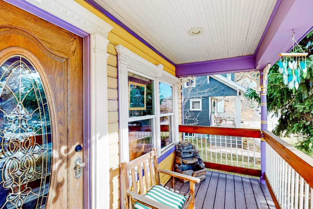 Restored downtown home with front porch, mountain views, & washer/dryer