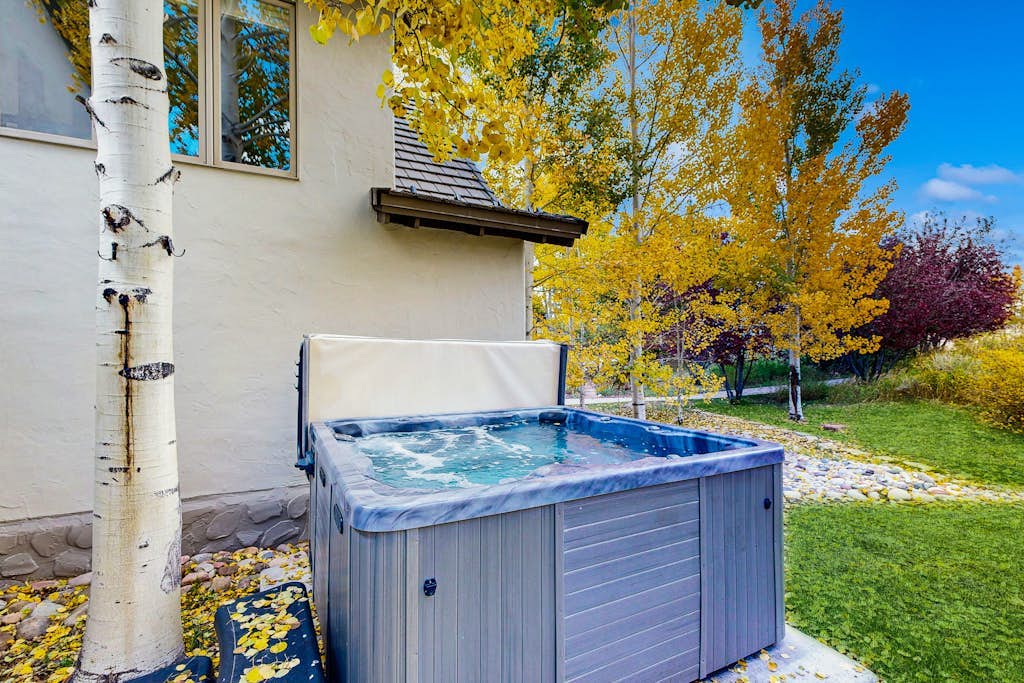 Spacious home w/ private hot tub, modern kitchen, grill & great location
