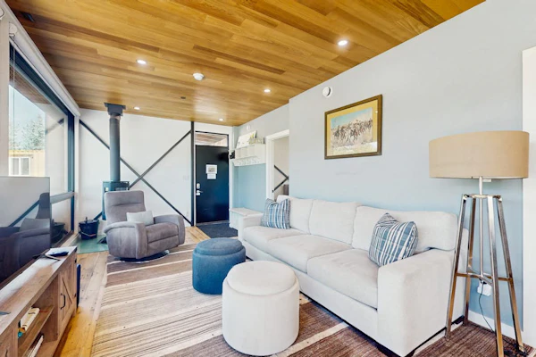 Secluded unique home in prime location with deck, woodstove, & mountain view