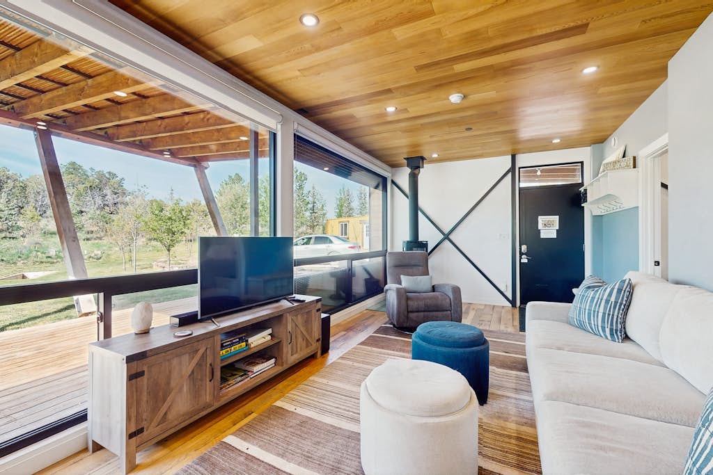 Secluded unique home in prime location with deck, woodstove, & mountain view