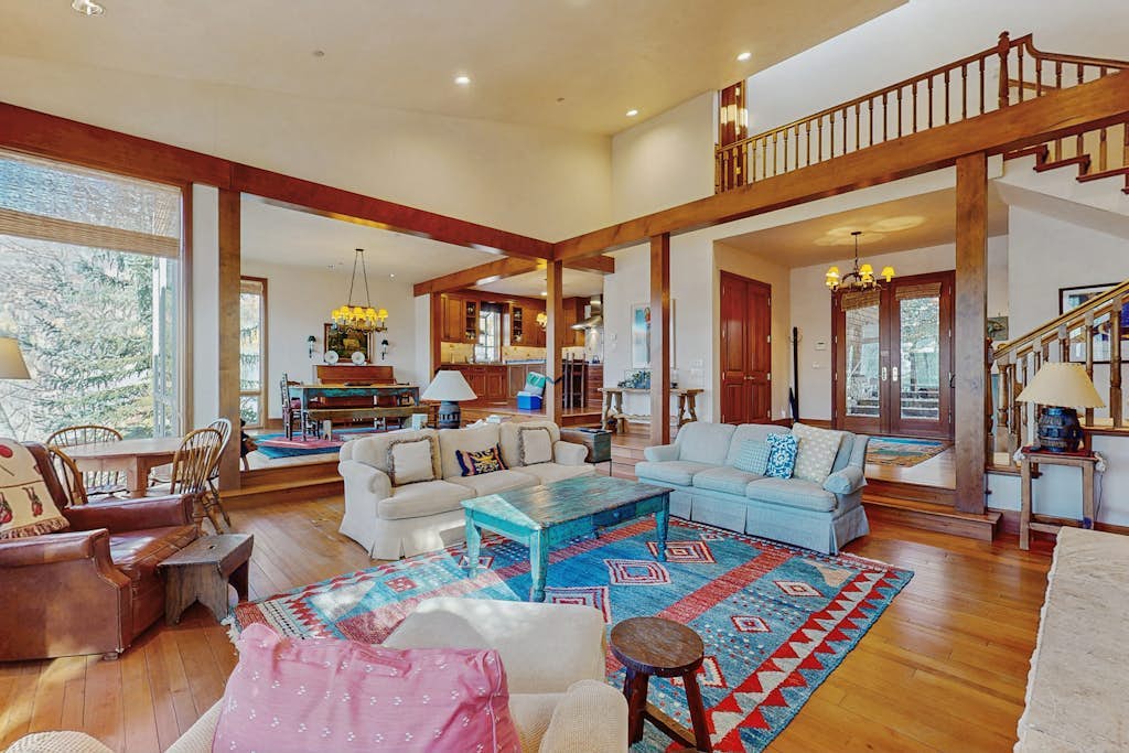 Elegant Aspen townhouse with an inviting  deck, fireplace, and washer/dryer