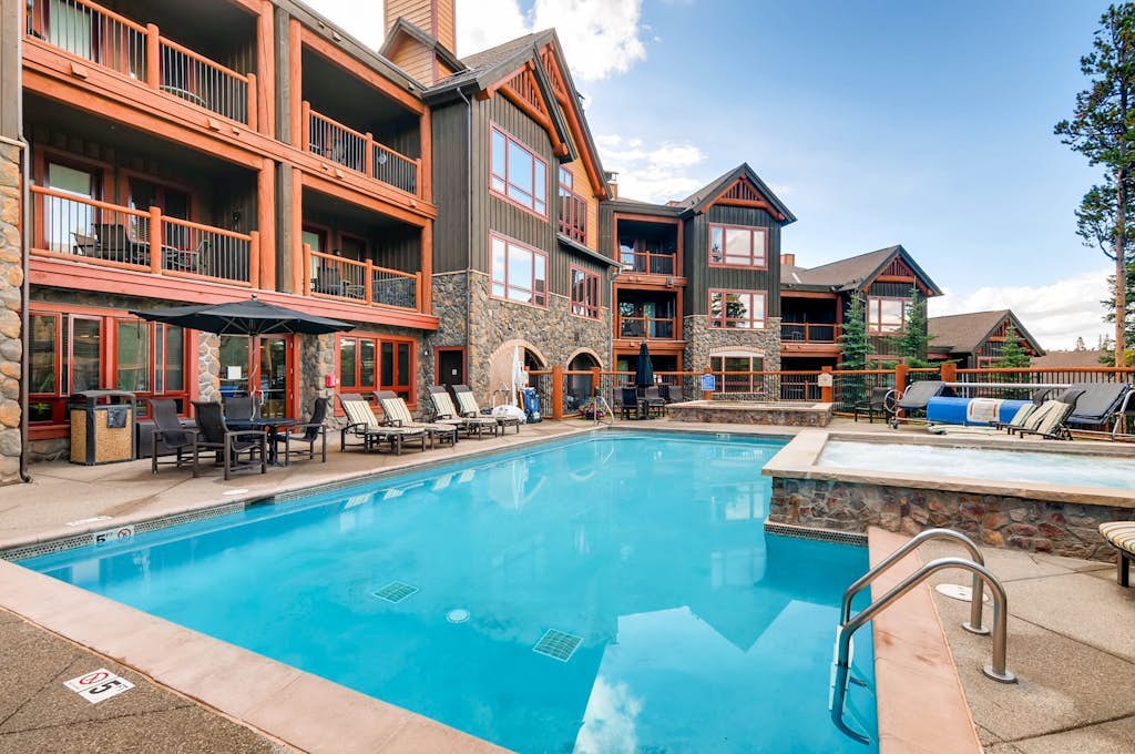 Ski-in/out condo near downtown with 3 hot tubs, pool, gym & game room