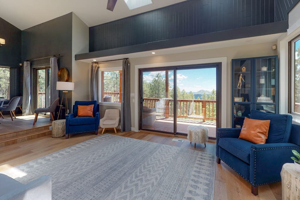 Enchanting mountainside home with fireplace, skiing, lake view, & washer/dryer