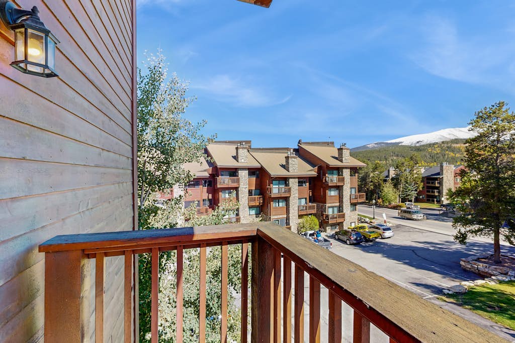 Sunny ski-in condo with mountain views, hot tubs, fireplace  & gym