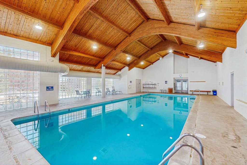 Dog-Friendly Condo with Mountain Views, a Shared Indoor Pool, & a Hot Tub