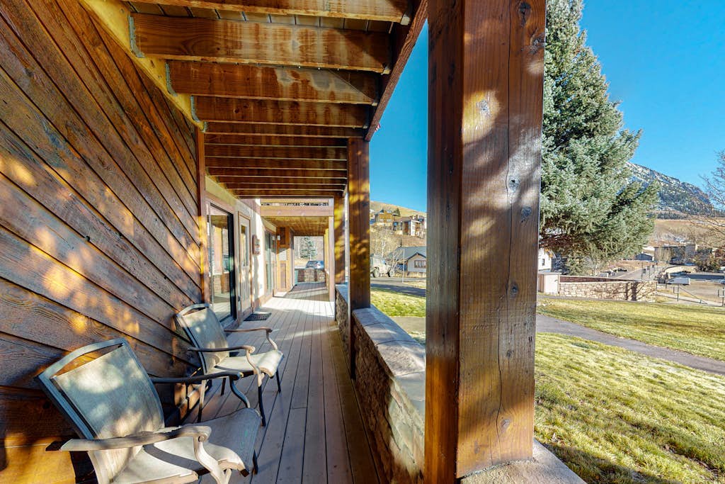 Mountain-view condo with private deck, fireplace & hot tub