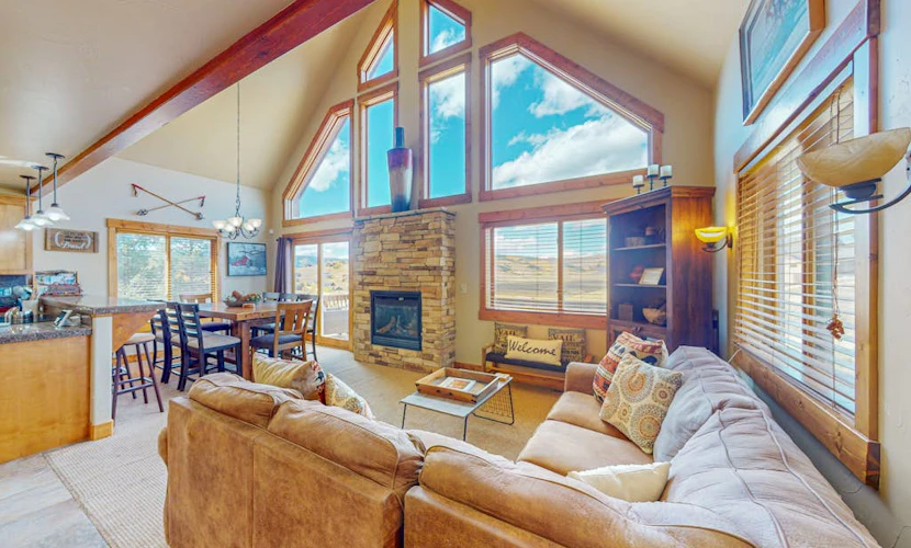 Mountain-view home with private hot tub, fireplace & great family rooms