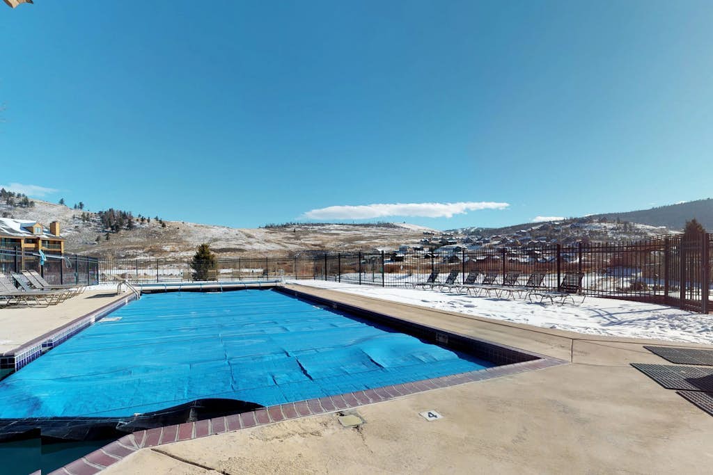 3rd-floor condo with balcony, indoor & outdoor pools, game room, gym, W/D