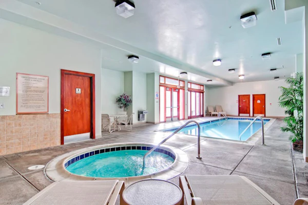 Chic mountain condo with ski area views, indoor pool & hot tub, shuttle to lifts