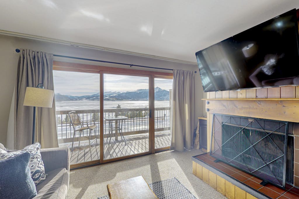 Lake & ski view condo | Pool, hot tub, sauna & cozy fireplace