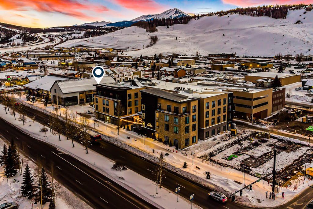 Boutique Condo with Mountain Views, Hot Tub & Walkable Location