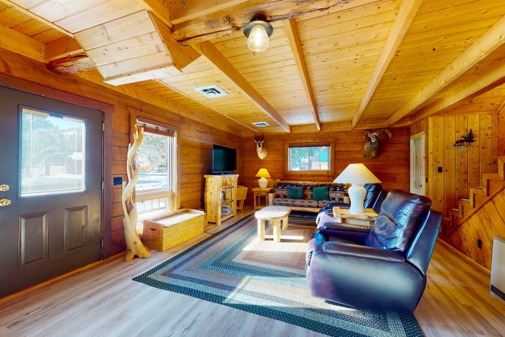 Riverfront home with river & valley views, wood stove, deck, & W/D