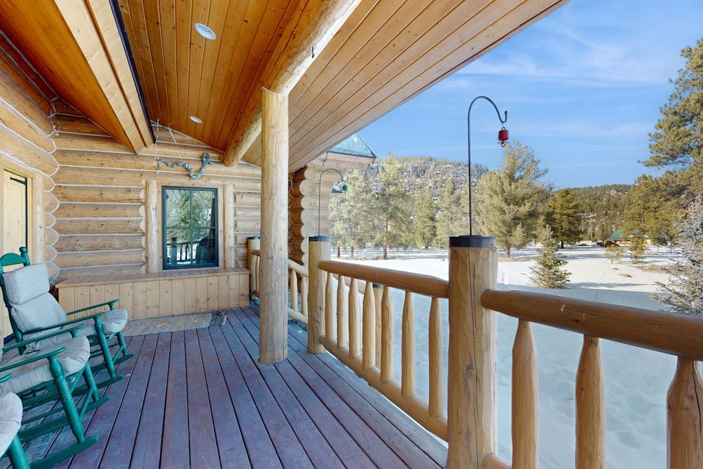 Charming cabin surrounded by trees with deck, grill, fireplace, games, & W/D