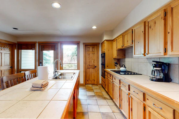 Large split-level condo with valley & mountain views plus hot tubs