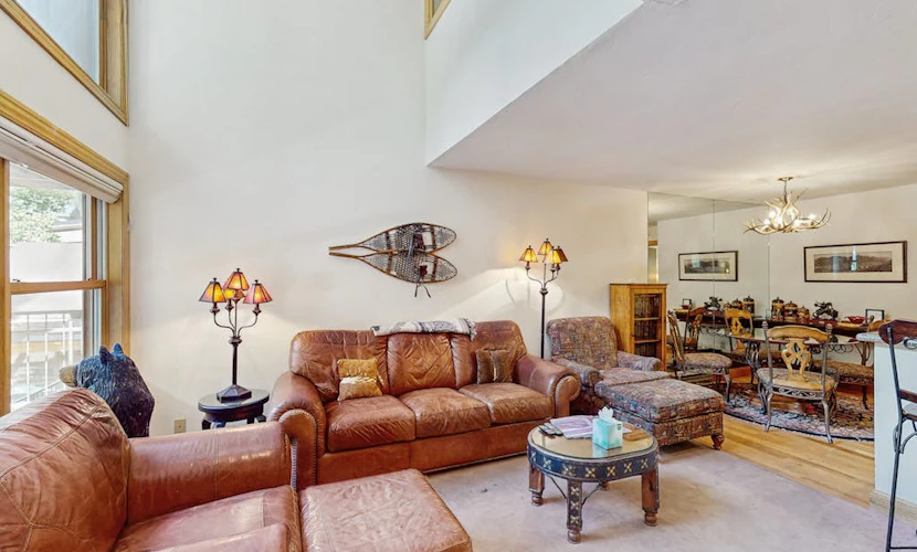 Stunning ski-in/out condo with balcony, fireplace, hot tub, & mountain views