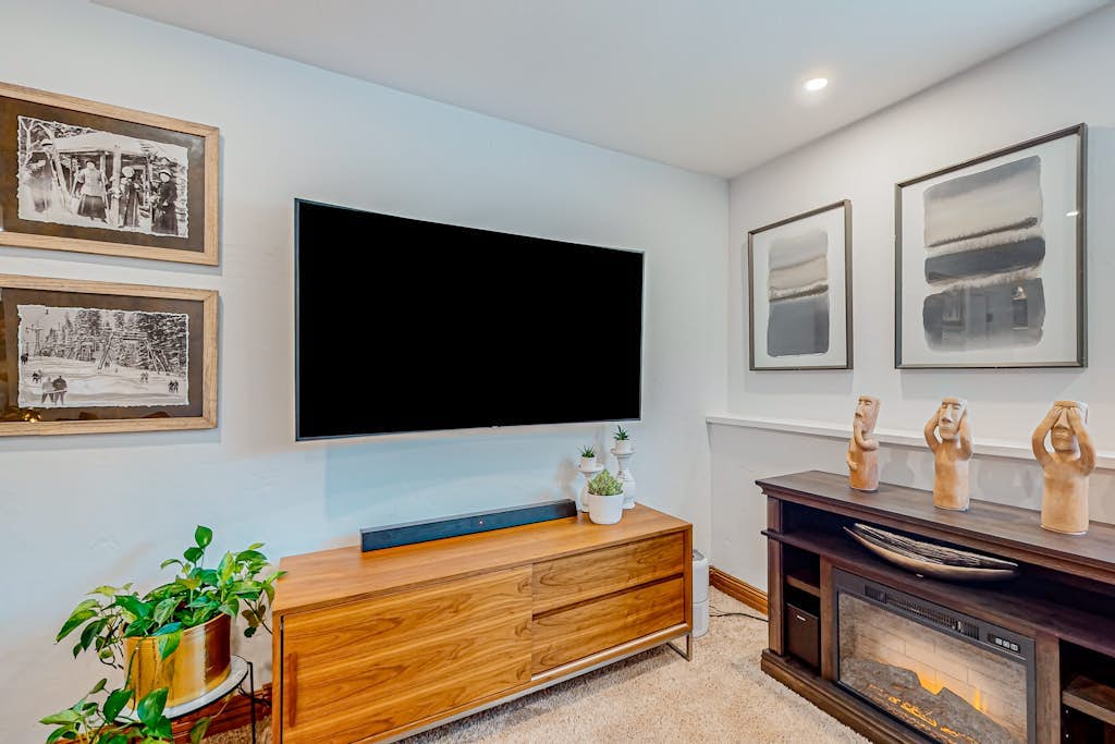 Centrally located condo with office, fireplace, W/D, & ski closet