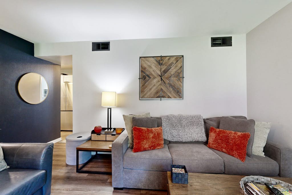 Mountain-view condo with outdoor pool, fireplace, patio, pool table & W/D