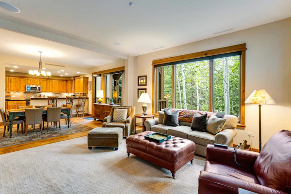 Second-floor retreat near the slopes with grill, fireplace, pool, & hot tub