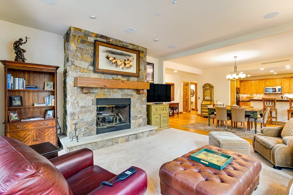 Second-floor retreat near the slopes with grill, fireplace, pool, & hot tub