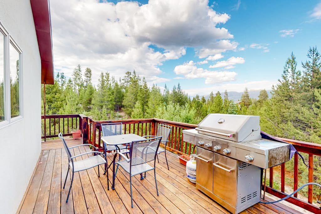 Gorgeous home with a stunning lake & mountain view, deck & gas fireplace