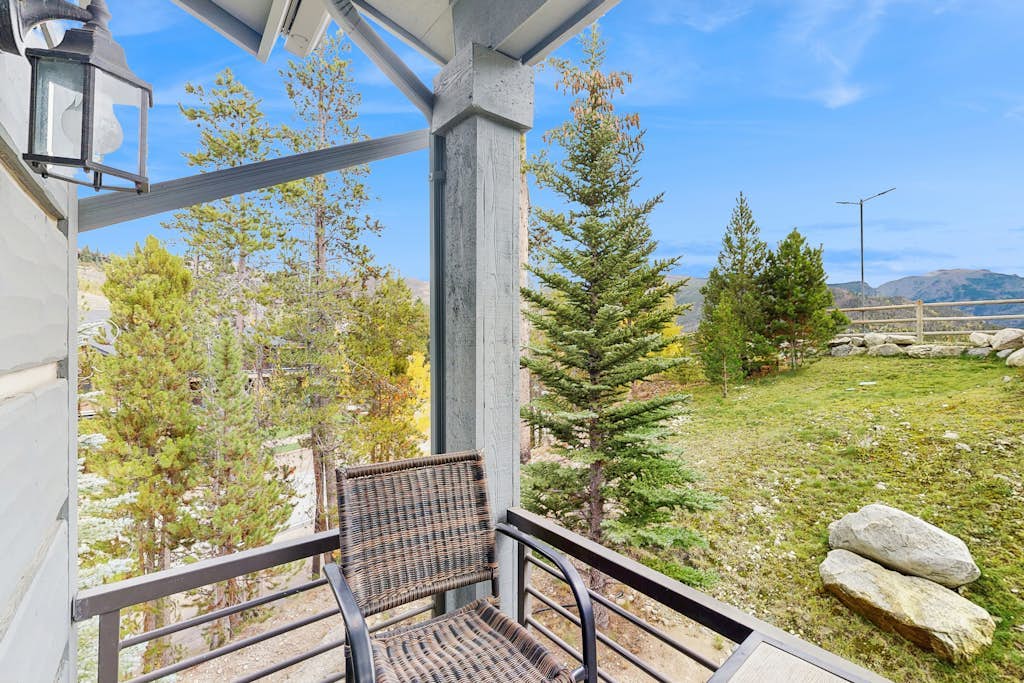Luxe downtown condo with mountain views, balcony, grill, fireplace, & W/D