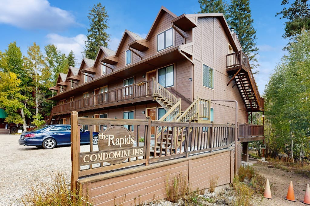 Riverfront, mountain-view retreat with a full kitchen and fireplace