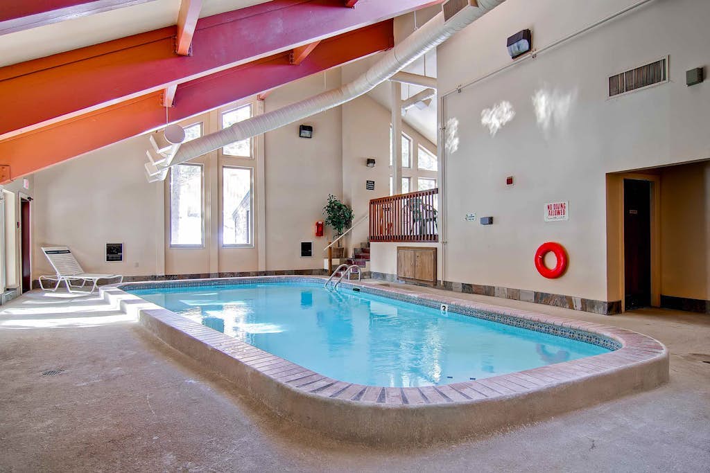 Ski-in/out condo with pool, hot tub & gas fireplace - walk to Snowflake Lift