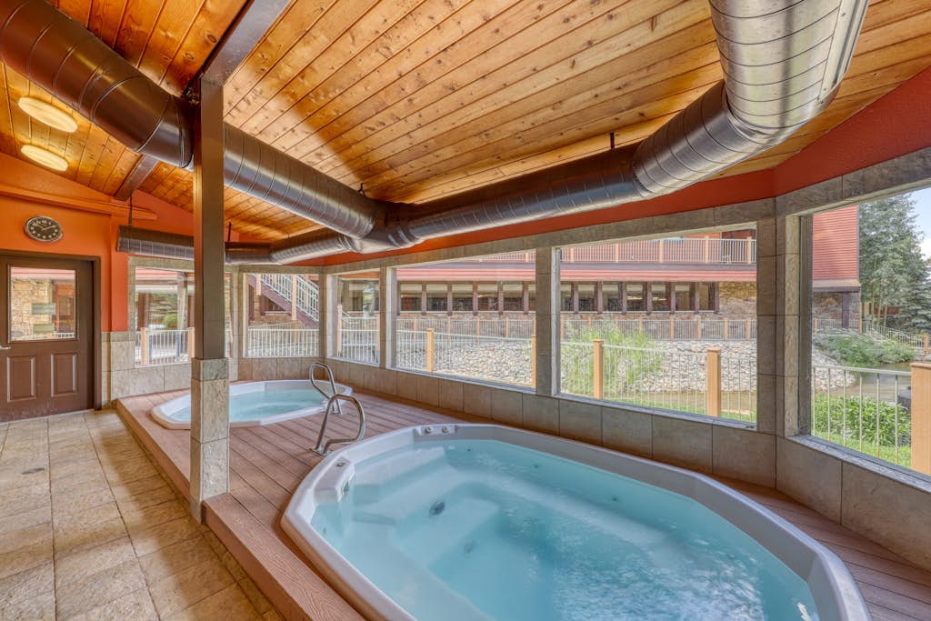 Rustic mountain escape with fireplace, W/D, hot tub, & grill - near skiing