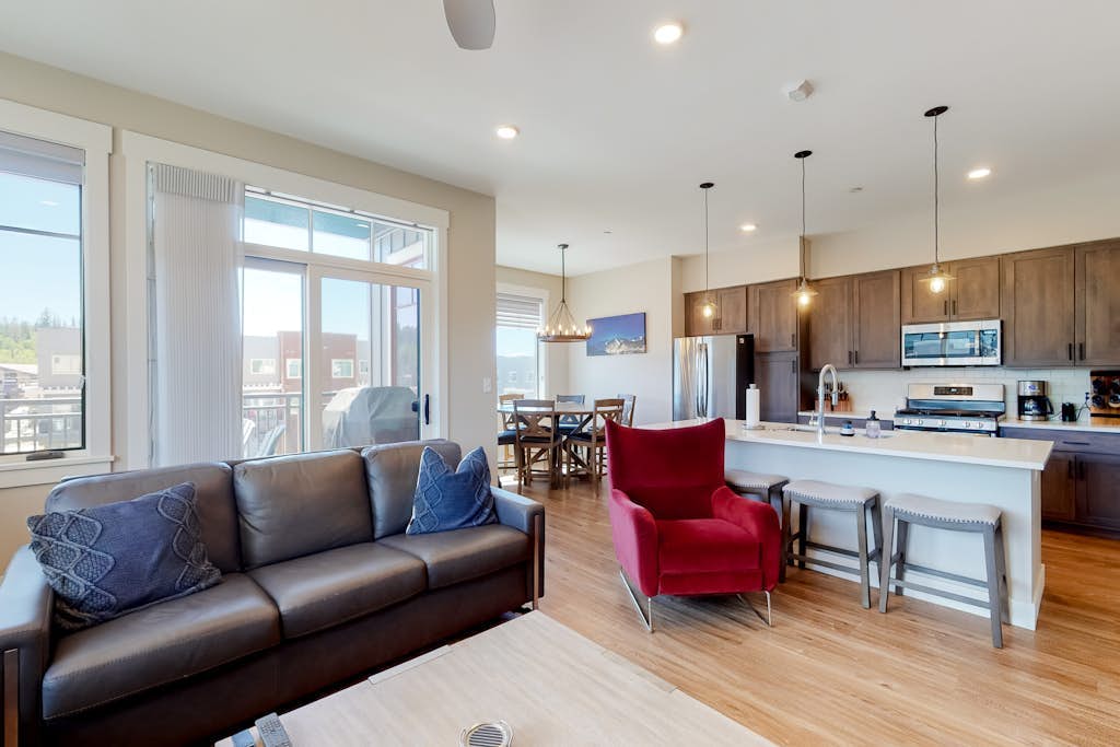 Mountain-view corner condo with hot tub access & fireplace